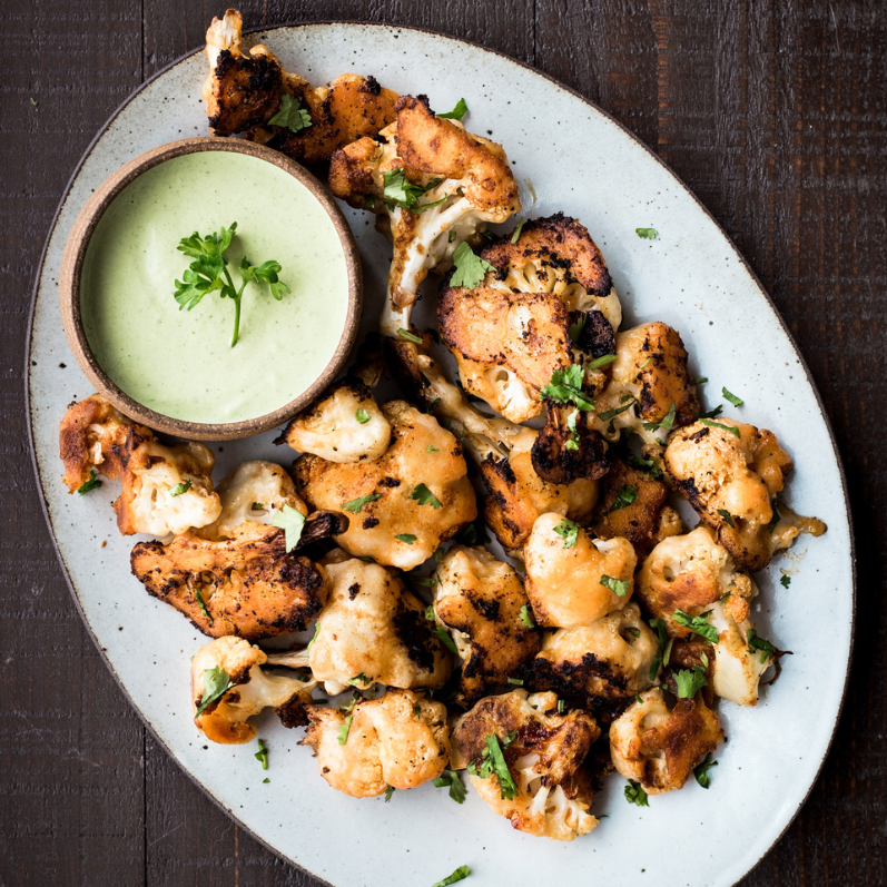 Buffalo Cauliflower Bites with Herbed Tahini 